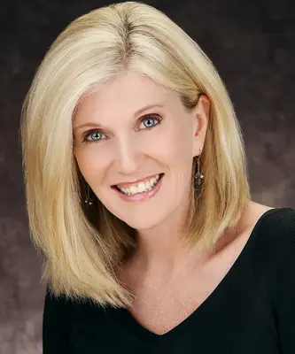 Portrait of Julie Mathews-Johnson, REALTOR®